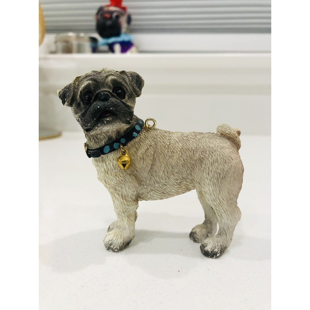 Pug Dog Wearing Black Collar With A Hell Christmas Ornament